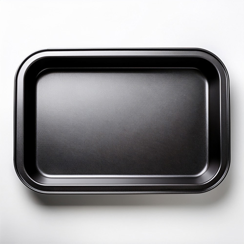 Food skills 6 Black metal rectangular baking dish on a white background