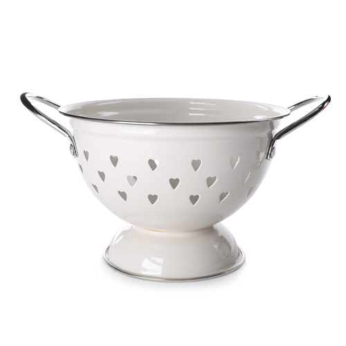 Food skills 10 White enamel colander on white background
